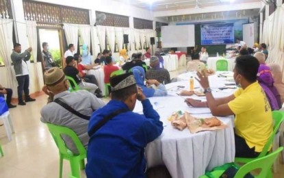 <p><strong>MORO CODE DRAFTING.</strong> The formal launch on the drafting of the Moro People's Welfare and Development Code in North Cotabato province as spearheaded by Governor Nancy Catamco (seated center) at the provincial capitol on Thursday (Dec. 3, 2020). The meeting was attended by representatives of various Moro communities in the province. <em>(Photo courtesy North Cotabato PIO)</em></p>