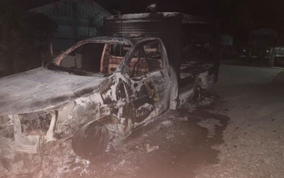 <p><strong>BURNED.</strong> The police car torched by suspected Bangsamoro Islamic Freedom Fighters following their attack on the town proper of Datu Piang in Maguindanao on Thursday night (Dec. 3, 2020). The Army’s 6th Infantry Division said they have controlled the situation in the area and its troops are now in pursuit of the attackers. <em>(Photo courtesy of 6ID)</em></p>