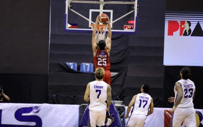 <p><strong>POWER SLAM.</strong> Ginebra's Japeth Aguilar is all alone for a slam dunk during the first half of Game 4 of the PBA Finals on Sunday (Dec. 6, 2020) at the Angeles University Foundation Sports and Cultural Center. Barangay Ginebra moved to within a win from clinching the PBA title after taking down TNT Tropang Giga, 98-88. <em>(Photo courtesy of PBA Images)</em></p>