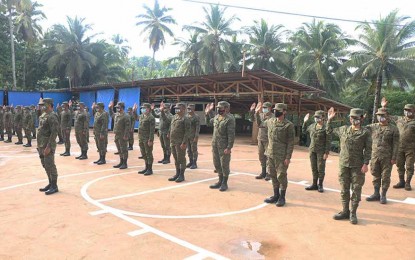 <p><strong>RENEWAL OF VOW</strong>. Personnel of the 30th Infantry Battalion of the Army renew their commitment to respect and protect human rights in a ceremony held at the unit’s headquarters in Placer, Surigao del Norte on Dec. 7, 2020. The renewal of vow was in line with the commemorations of the National Human Rights Consciousness Week this year. <em>(Photo courtesy of 30th IB)</em></p>