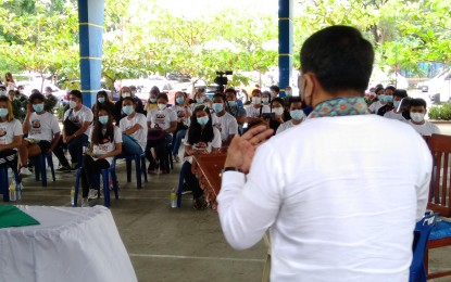 <p><strong>SUMMIT VS. DRUGS, TERRORISM.</strong> Undersecretary Joel M. Sy Egco, Presidential Task Force on Media Security (PTFoMS) executive director, addresses the youth and peace stakeholders during a summit at the Nueva Ecija Police Provincial Office on Tuesday (Dec. 8, 2020). Egco urged leaders of the Sangguniang Kabataan and Kabataan Kontra Droga At Terorismo (KKDAT), to help shield Filipino families, especially the youth, from illegal drugs and terrorism<em>. (Photo by Marilyn Galang)</em></p>