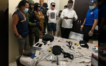 <p><strong>CRACKDOWN VS. LOOSE FIREARMS.</strong> CIDG members seize various kinds of loose firearms in four separate operations in Quezon City, Manila, and Mandaluyong early on Thursday (Dec. 10, 2020). The operations were launched by virtue of search warrants issued by the Quezon City Regional Trial Court Branch 89. <em>(Photo courtesy of CIDG)</em></p>