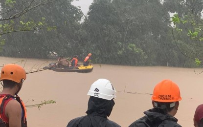 <p><strong>DISASTER RESPONSE</strong>. Rescuers in Pudtol, Apayao brave the floodwaters as they respond to a distress call from stranded residents of Barangay Alem on Sunday (Dec. 13, 2020). Incessant rains since Saturday night caused flash flood in the area. <em>(Photo from the Facebook page of the Municipal Government of Pudtol)</em></p>