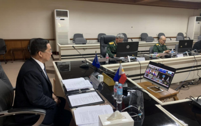 <p><strong>TACKLING SECURITY ISSUES.</strong> DND Undersecretary Cardozo Luna (left) listens to the proceedings of the virtual 14th Asean Defense Ministers’ Meeting (ADMM) from the Conference Room of the DND on Dec. 10, 2020. During the meeting, Luna cited the need to tackle important security issues despite the challenges brought by the Covid-19 pandemic. <em>(Photo courtesy of DND Defense Communications Service)</em></p>