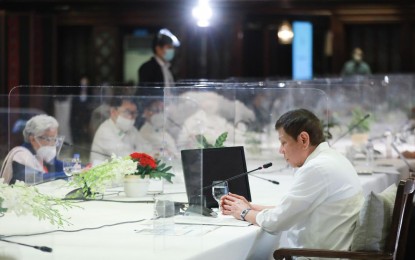 <p><strong>PHILHEALTH</strong>. President Rodrigo Roa Duterte presides over the 49th Cabinet Meeting at Malacañan Palace on Dec. 14, 2020. The President called a meeting to discuss pressing issues, including Philippine Health Insurance Corp. (PhilHealth), and updates from different government agencies.<em> (Presidential photo by Ace Morandante)</em></p>