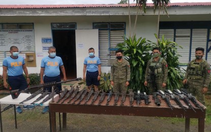 <p><strong>REBEL FIREARMS.</strong> The Army's 97th Infantry Battalion turns over Thursday (December 17, 2020) 23 assorted high-powered firearms to the Zamboanga del Norte Provincial Police Office for processing as part of the requirements in the government's Enhanced Comprehensive Local Integration Program. Lt. Col. Manaros Boransing, 97IB commander, said the firearms were surrendered by the NPA's cell HQ-KALAW, which was dismantled by government forces in August 2020. <em>(Photo courtesy of 97IB)</em></p>