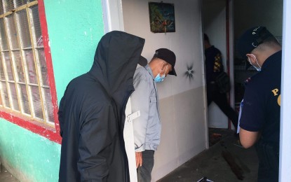 <p><strong>SHOOTOUT</strong>. Forensic experts examine the crime scene where the leader of a robbery hold-up group Dante Tecson Jr., was killed in a shootout in Barangay Calumpang, San Miguel, Bulacan on Friday (Dec. 18, 2020). The suspect was also the source of illegal drugs in San Miguel and other nearby towns in Bulacan.<em> (Photo courtesy of Bulacan PPO)</em></p>
