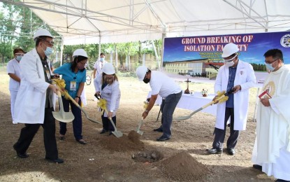 <p> </p>
<p><strong>NEW ISOLATION FACILITY.</strong> Officials of the province of Pangasinan, including Provincial Health Office chief Dr. Anna Ma. Teresa de Guzman (third from left) and board member Jeremy Rosario (third from right), lead the groundbreaking ceremony of the province’s new isolation facility on Dec. 22, 2020. The facility will be situated at the Pangasinan Provincial Hospital at San Carlos City.<em> (Photo by Province of Pangasinan)​</em></p>