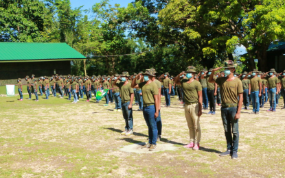 <p><strong>READY TO SERVE</strong>. A total of 467 Cafgu active auxiliary members stand at attention during their graduation at the 6th Infantry Division (6ID) training camp in Barangay Taviran, Datu Odin Sinsuat, Maguindanao on Saturday (Dec. 26, 2020). After completing their six-month basic military training, the new batch of militiamen will be deployed to various provinces under the 6ID’s area of responsibility in Central Mindanao. <em>(Photo courtesy of 6ID)</em></p>