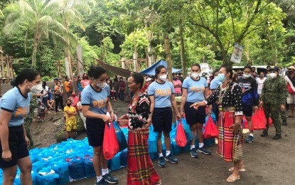 <p><strong>IMPROVED</strong>. Women members of the Blaan tribe of Sitio Nopol, Barangay Mabuhay in General Santos City receive gifts from police personnel in an outreach activity in December last year. Datu Fulong Dan Alim, Blaan tribal chieftain, said the situation in their village, which suffered from years of poverty and neglect, has vastly improved in the last two years due to interventions facilitated by the National Task Force to End Local Communist Armed Conflict. (<em>PNA GenSan file photo</em>)</p>
<p> </p>