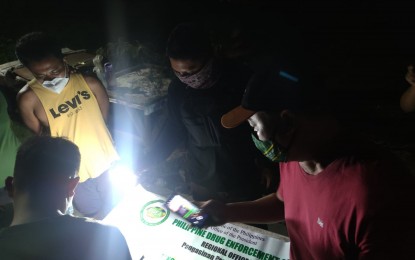 <p><strong>BUSTED</strong>. The Philippine Drug Enforcement Agency (PDEA) arrested on Jan. 6, 2021 the top 4 high-value target in Pangasinan. The suspect (wearing a yellow shirt) was allegedly operating in Dagupan City and Central Pangasinan. <em>(Photo by Ahikam Pasion)</em></p>