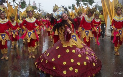 <p><strong>NO STREET DANCING.</strong> Dancers clad in colorful costumes participate in the street dancing event for the Kahimunan Festival in Butuan City in this undated photo. This year's street dancing for the festival is canceled in compliance with health protocols to contain the spread of the coronavirus disease 2019 (Covid-19). <em>(Photo from Butuan City PIO Facebook Page)</em></p>