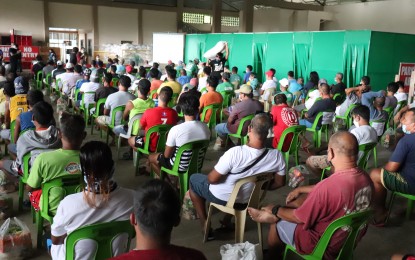 <p><strong>ASSISTANCE</strong>. More than 600 displaced motorbanca crew members in Guimaras receive assistance from the office of Senator Bong Go and the Department of Social Welfare and Development on Thursday (Jan. 14, 2021). The crew members lost their means of livelihood after their certificates of public convenience and certificates of Philippine Registry were not extended by the Maritime Industry Authority. <em>(Photo courtesy of the Public Information and Relations Guimaras)</em></p>