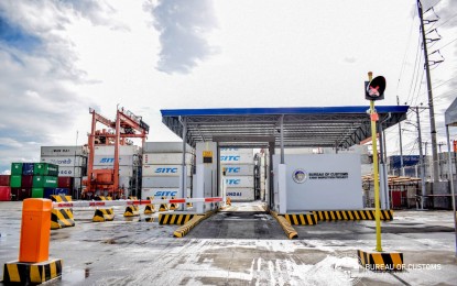 <p><strong>X-RAY SCANNING MACHINE.</strong> A portal-type X-ray machine is installed at the Davao International Container Terminal (DICT) on Jan. 12, 2021. The BOC said the machine will increase the port’s daily maximum inspection capacity as it can scan up to 160 containers per hour. <em>(Photo courtesy of BOC)</em></p>