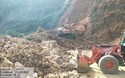 <p><strong>ROAD CLEARING</strong>. Heavy equipment are deployed in the ongoing clearing operation of a landslide-hit road portion in Taft, Eastern Samar on Thursday (Jan. 14, 2021). The Department of Public Works and Highways (DPWH) on Friday (Jan. 15, 2021) said the road remains closed as work continues to clear the road affected by the landslide brought by heavy rains this week. <em>(Photo courtesy of DPWH)</em></p>
