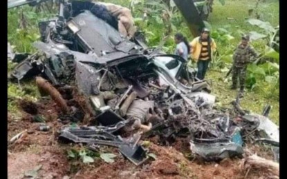 <p><strong>HELICOPTER CRASH</strong>. The ill-fated UH-1H Huey helicopter that crashed in Barangay Bulonay, Impasugong, Bukidnon on Saturday afternoon (Jan. 16, 2021), killing seven men on board. This photo circulated online on Sunday. <em>(Contributed Photo/8IB)</em></p>