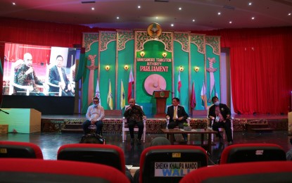<p><strong>ACCOMPLISHMENT.</strong> Bangsamoro Transition Authority Speaker Pangalian M. Balindong (2nd from right) is joined by BTA Deputy Speaker Omar Yasser C. Sema (2nd from left), BTA Majority Floor Leader Lanang T. Ali, Jr. (left), and Member of Parliament Jose Lorena (right) during the press conference held Tuesday (Jan. 19, 2021) inside the BARMM complex in Cotabato City. The BTA leaders highlighted the passing of 15 major regionals laws for the two-year-old political entity.<em> (Photo by PNA Cotabato)</em></p>