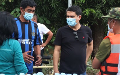 <p>Tabuk City Mayor Darwin Estrañero (in black) at the height of the Covid-19 pandemic (Contributed photo)</p>