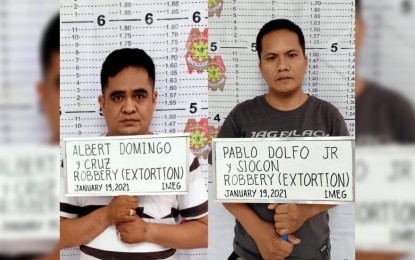 <p>Binangonan Police Station’s alleged civilian assets Albert Domingo alias Joel and Pablo Dolfo alias Botchok. <em>(Courtesy of PNP PIO)</em></p>