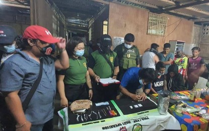 <p><strong>BUSTED.</strong> Agents of the Philippine Drug Enforcement Agency-Region 12 conduct an inventory of the seized illegal drugs and other pieces of evidence from an alleged “drug den” in Barangay San Isidro, General Santos City in an operation on Thursday (Jan. 21, 2021). The source or shabu supplier of the den was later arrested in a follow-up operation in Barangay Dadiangas North. <em>(Photo courtesy of PDEA-12)</em></p>