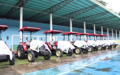 <p><strong>FREE POST-HARVEST MACHINES</strong>. Four-wheel drive tractors were distributed to 23 farmers' cooperatives and associations in Antique on Jan. 22, 2021. The beneficiaries were told to take care of and maintain the post-harvest facilities that were given to them for free. <em>(Photo courtesy of Antique PIO)</em></p>