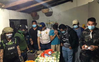 <p><strong>BIG SHABU HAUL.</strong> Operatives of the National Bureau of Investigation and the Philippine Drug Enforcement Agency seize on Sunday (Jan. 24, 2021) a kilo of shabu with an estimated value of PHP6.8 million during a buy-bust operation in Barangay Tambacan, Iligan City.  Authorities also arrest suspect Mahid Amer, 22. <em>(Photo courtesy of NBI-Iligan)</em></p>