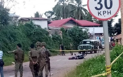 <p><strong>SEALED OFF.</strong> Police and military authorities seal off a section of the highway in Barangay Poblacion Romongaob, South Upi, Maguindanao, following a roadside explosion on Tuesday morning (Jan. 26, 2020). A motorcycle driver was killed while his back-rider was hurt as the roadside bomb went off as they were passing through the area. <em>(Photo courtesy of Radyo Bida Cotabato)</em></p>