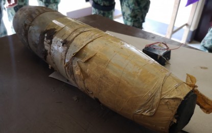 <p><strong>IMPROVISED BOMB.</strong> The second improvised explosive device (IED) found and deactivated by military and police bomb disposal experts at the highway in South Upi, Maguindanao where an initial roadside blast killed a motorist and wounded another on Tuesday morning (Jan. 26, 2020). The second IED was rigged from a 105-mm. Howitzer ammunition, and the first, from an 81-mm. mortar projectile. <em>(Photo courtesy of DXMS Radyo Bida)</em></p>