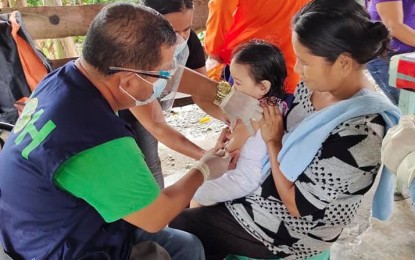 <p><strong>PREVENTING OUTBREAK</strong>. A child is being vaccinated in Tabontabon, Leyte in this Feb. 2, 2021 photo. The Department of Health (DOH) has extended measles and oral polio vaccination in Eastern Visayas until March 7 as several areas failed to meet the 95 percent coverage. <em>(Photo courtesy of Tabontabon Rural Health Unit)</em></p>