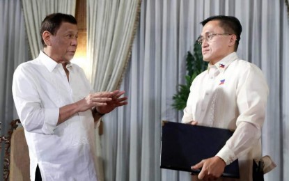 <p>President Rodrigo Duterte (left) and Sen. Christopher Lawrence Go (right). <em>(Presidential photo)</em></p>