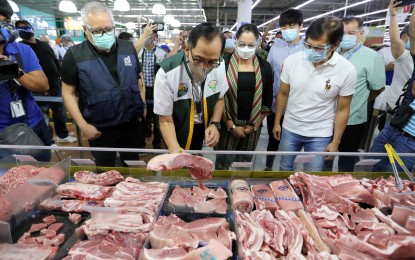 <p><strong>PORK PRICES. </strong>The Department of Agriculture (DA) reported on Wednesday (Sept. 29, 2021) that prices of pork have started to normalize in the markets. The DA said it will continue to assist pork producers to maintain this momentum and push the industry to sustain its repopulation and recovery. (<em>PNA file photo) </em></p>