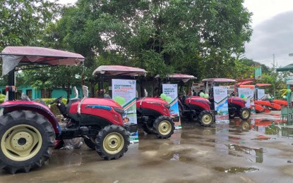 <p><strong>FARM MECHANIZATION.</strong> Thirteen four-wheel tractors, 11 hand tractors, 18 floating tillers, and other types of production and harvest machinery worth PHP42.38 million are distributed by the Department of Agriculture in Caraga and the Philippine Center for Postharvest Development and Mechanization to 15 rice-based farmers’ cooperatives and associations in Agusan del Norte on Wednesday (Feb. 10, 2021) in Taguibo, Butuan City. DA-13 officials underscore the importance of mechanization in cutting post-harvest losses and in increasing productivity. <em>(Photo courtesy of DA-13 Information Office)</em></p>