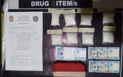 <p><strong>MAKATI BUY-BUST.</strong> Police officers recover PHP1.3 million worth of shabu from a retired Marine officer in a buy-bust in Makati City on Tuesday (Feb. 9, 2021). The National Capital Region Police Office (NCRPO) said the operation against the suspect Rufino Advincula Jr. was based on information provided by a tipster and the surveillance and monitoring on his illegal activities. <em>(Photo courtesy of NCRPO)</em></p>