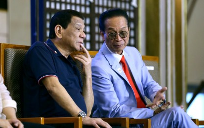 <p>Chief Presidential Legal Counsel Salvador Panelo and President Rodrigo Roa Duterte <em>(File photo)</em></p>