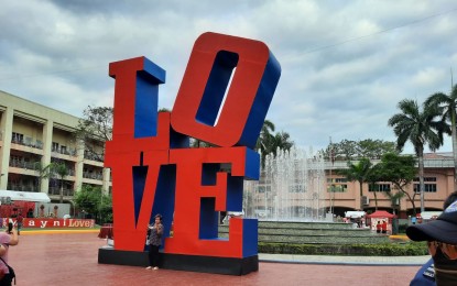 <p><strong>'MayniLOVE'.</strong> The word 'love' is spelled in big letters and attracts people visiting the 'MayniLOVE' in Mehan Garden in Lawton, Manila on Thursday (Feb. 11, 2021). Lovers, friends and even single people can celebrate love through different attractions for Valentine's Day. <em>(PNA photo by Marita Moaje)</em></p>