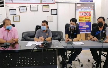 <p><strong>COMMUNITY TRANSMISSION.</strong> Puerto Princesa City information officer Richard Ligad (from left to right), Incident Management Team head Dr. Dean Palanca, City Health Office chief Dr. Ric Panganiban, and IMT operations officer Kent Ventura during their live presser Saturday night (Feb. 13, 2021) to announce the city under community transmission. Palanca said there are nine new confirmed positive cases for Covid-19, seven of which are local transmissions while two are cases from outside Palawan.<em> (Screenshot from live presser of Puerto Princesa City Information Office)</em></p>