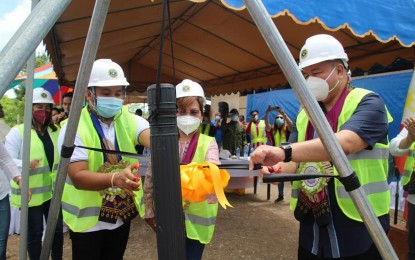 <p><strong>GROUNDBREAKING</strong>. Maasim, Sarangani Mayor Zyrex Pacquiao (left), and Department of Health (DOH)-Region 12 director Dr. Aristides Tan, lead the ribbon cutting for the time capsule of the PHP10 million treatment and monitoring center for coronavirus disease 2019 (Covid-19) patients in Barangay Bales on Tuesday (Feb. 17, 2021). The facility is one of the six being constructed in Region 12 (Soccsksargen) under Republic Act 11494 or the Bayanihan to Recover as One Act (Bayanihan 2). (<em>Photo courtesy of the municipal government</em>) </p>
<p> </p>