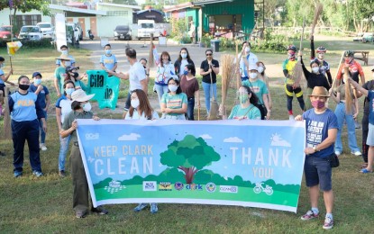 <p><strong>CLEAN-UP DRIVE.</strong> A multi-sectoral activity that aims to raise awareness in keeping the environment clean, especially the responsible use of public areas inside the Clark Freeport Zone in Pampanga was launched on Thursday (Feb. 18, 2021). Dubbed as “Keep Clark Clean Drive,” the project is an initiative of the Greater Clark Visitors Bureau (GCVB) that also aims to promote and enforce the “Clean As You Go" culture among park visitors inside Clark. <em>(Photo courtesy of Mabalacat City Government)</em></p>