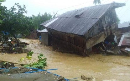 <p><strong>'AURING' DAMAGE.</strong> A house in Barangay Pongtod, San Agustin, Surigao del Sur is damaged by flood due to heavy rains caused by then tropical storm "Auring", now weakened into tropical depression, on Sunday (Feb. 21, 2021).  The weather disturbance has brought incessant rains for days, causing flooding in several low-lying areas. <em>(Photo courtesy of Marco Campos Orcullo)</em></p>