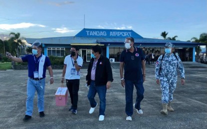<p><strong>TANDAG AIRPORT.</strong> Department of Transportation Secretary Arthur Tugade (2nd from right) and other government officials during a site inspection of Tandag Airport in Surigao del Sur on Wednesday (Feb. 24, 2021). Before flying back to Manila, Tugade ordered a comprehensive check of the airport and its facilities. <em>(Photo courtesy of DOTr)</em></p>