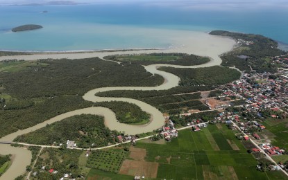 <p>Aerial photo showing the extent of the damage brought by Tropical Storm "Auring" in Surigao del Sur and Surigao del Norte <em>(Presidential Photo)</em></p>