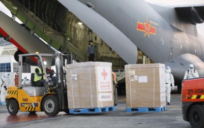 <p><strong>CHINA DONATES VACCINES.</strong> Boxes of Chinese government-donated coronavirus vaccines produced by Sinovac Biotech pharmaceutical firm arrive in PH on Sunday (Feb.28, 2021). The actual inoculation of Filipinos under the government's priority list will begin this Monday (March 1). <em>(PNA photo by Avito Dalan)</em></p>