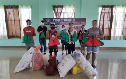 <p><strong>PROJECT BARTER</strong>. Some of the residents who collected plastic waste in exchange for food items in Carigara, Leyte in this Feb. 24, 2020 photo. The local government of Carigara, Leyte has urged residents to participate in the program. <em>(Photo courtesy of Carigara local government)</em></p>