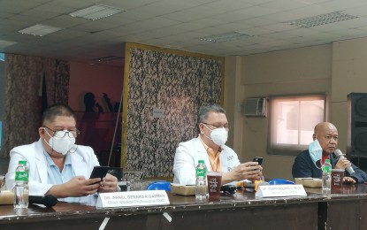 <p><strong>VAX PROGRAM</strong>. Region 1 Medical Center (R1MC) chief, Dr. Roland Joseph Mejia (middle), gives an update on the vaccination of the first batch of medical front-liners of the R1MC on March 4, 2021. R1MC is one of the hospitals in the Ilocos Region to receive Sinovac vaccines. <em>(Photo by Hilda Austria)</em></p>