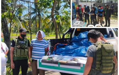 <p><strong>BUSTED.</strong> Anti-narcotics agents account for the estimated PHP6.8-million shabu seized from drug suspect Romie Diamillah Hadji Alawi in Malabang, Lanao del Sur on Thursday (March 4, 2021). On the same day, authorities also arrested drug suspects Saidin Campong and Salipudin Usop in Cotabato City who yielded PHP3.4-million shabu were confiscated from them during an entrapment witnessed by Mayor Cynthia Guiani-Sayadi (center, inset) in Barangay Poblacion 2. <em>(Photo courtesy of PDEA-BARMM)</em></p>