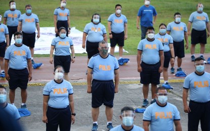 <p><strong>FITNESS FIRST.</strong> PNP chief, Gen. Debold Sinas leads cops in an exercise session during the launch of the Chubby Anonymous Project in Camp Crame on Thursday (March 4, 2021). The launch of the program coincided with the observance of the World Obesity Day.<em> (Photo courtesy of PNP)</em></p>