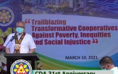 <p><strong>PARTNERS FOR INCLUSIVE GROWTH</strong>. Department of Trade and Industry (DTI) Secretary Ramon Lopez graces the 31st anniversary of the Cooperative Development Authority (CDA) on Wednesday (March 10, 2021). Lopez said the DTI and CDA have been partners in delivering services to small-scale businesses in the grassroot level. <em>(Screengrab from CDA Facebook page)</em></p>
