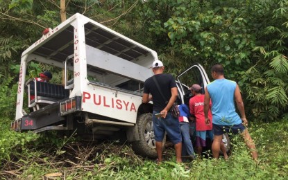 <p><strong>DESPICABLE ACT.</strong> The Lambunao municipal police station patrol car is damaged after being hit by an improvised explosive device in Barangay Pughanan, Lambunao, Iloilo, on Friday (March 12, 2021). In a statement, the Western Visayas Regional Task Force to End Local Communist Armed Conflict condemned the attacks, blamed on CPP-NPA rebels. <em>(Contributed photo)</em></p>