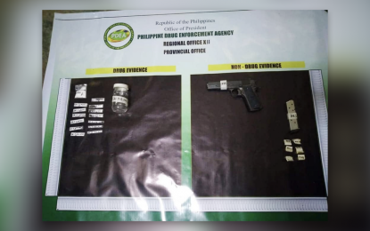 <p><strong>SEIZED.</strong> The packets of shabu items and pistol confiscated from drug suspect Tanny Taup following a law enforcement operation in Banisilan, North Cotabato, on Sunday (March 14, 2021). Authorities say the suspect is classified as a high-value target in the drug watch list. <em>(Photo courtesy of PDEA-12)</em></p>