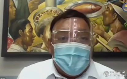 <p><strong>POSITIVE.</strong> Presidential Spokesperson Harry Roque holds a virtual Palace press briefing on Monday (March 15, 2021). Roque announced that he has tested positive for Covid-19. <em>(Screengrab from PCOO/RTVM)</em></p>